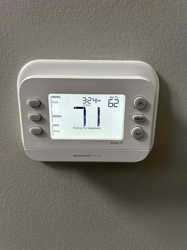 Responded to no cooling complaint on 11-year-old electric furnace/AC system with downstairs zones blowing warm air. Upon inspection, found faulty capacitor affecting compressor operation. Replaced dual-run capacitor, verified proper electrical connections and wire terminations, tested system operation across all zones, and confirmed thermostat communication with equipment resulting in proper cooling delivery to all rooms.