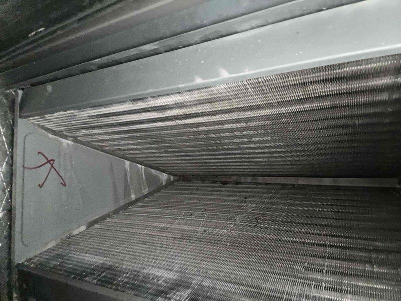 Completed six-month routine maintenance on a four-year-old air conditioning system. Performed comprehensive AC tune-up including inspection of evaporator coils, which showed normal operational dust accumulation on fins, and electrical system diagnostics. Measured capacitor performance using clamp meter, recording readings within normal operating parameters. All components functioning properly with no repairs required.