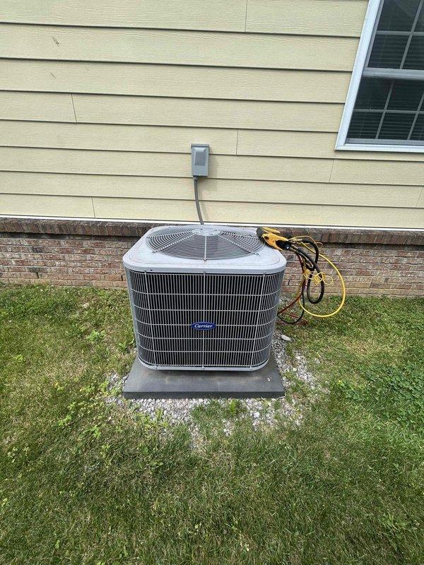 Completed monthly club maintenance service on residential heat pump system with air handler located in attic accessible through garage. Performed comprehensive inspection of outdoor condensing unit, verifying proper operation of compressor, condenser fan motor, and electrical connections. Checked refrigerant levels and system pressures within manufacturer specifications. Inspected electrical disconnect, conduit, and wiring for any signs of damage or wear. Cleaned condenser coil and cleared debris from unit perimeter to ensure adequate airflow.

Accessed attic-mounted air handler via garage entry point. Replaced existing 20x20x1 Glasfloss air filter with new filter to maintain proper airflow and indoor air quality. Inspected air handler cabinet, blower assembly, and evaporator coil. Verified condensate drain line is flowing freely with no blockages. Checked all electrical connections and safety controls for proper operation. System operating normally with no deficiencies noted at time o
