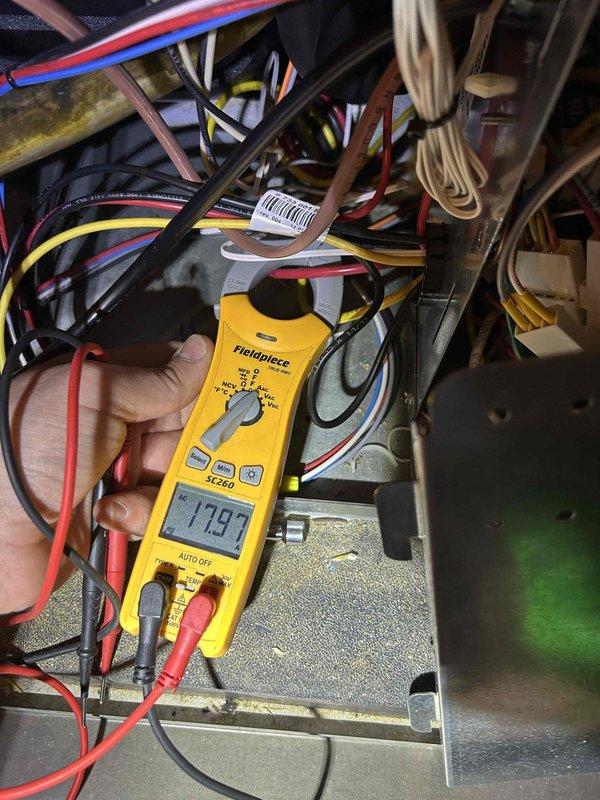 Completed preventive maintenance tune-up on geothermal system located in basement. Performed electrical diagnostics using clamp meter, recording voltage reading of 179.7V at control panel and amp draw of 6.48A at circulation pump. Inspected all system components, wiring connections, and mechanical equipment for proper operation. Customer provided air filters for system as part of care plan service.