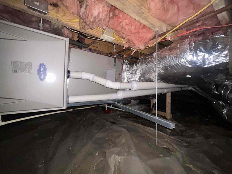 Completed annual Care Plan tune-up on Carrier AC system with air handler located in crawl space and condenser unit positioned in side yard. Performed comprehensive maintenance inspection of both indoor and outdoor components, verified proper operation of all system functions, and documented equipment condition with photos as part of the complimentary first-year Care Plan included with recent installation.