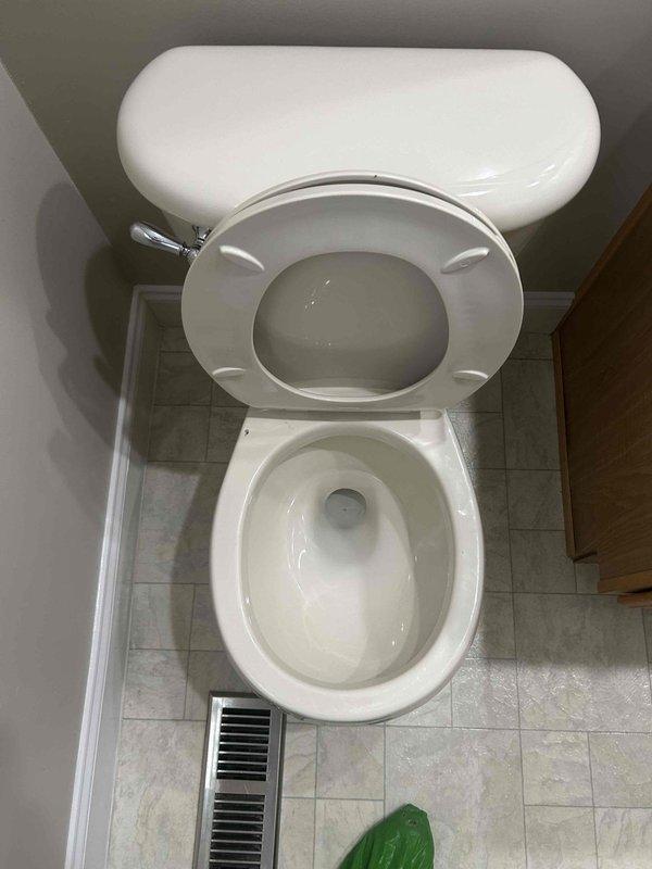 Responded to service call for toilet leaking around the base and defective water shut-off valve. Upon inspection, discovered the toilet required reseating due to failed wax ring seal causing water leakage at floor connection. Removed and reset toilet with new wax ring and closet bolts to ensure proper seal. Replaced corroded water supply shut-off valve with new quarter-turn angle stop valve for improved functionality and leak prevention. Additionally, installed new drain stopper assembly in bathroom shower per customer request. Tested all repairs for proper operation and verified no active leaks at toilet base, supply line connections, or shower drain. All plumbing fixtures left in working order.