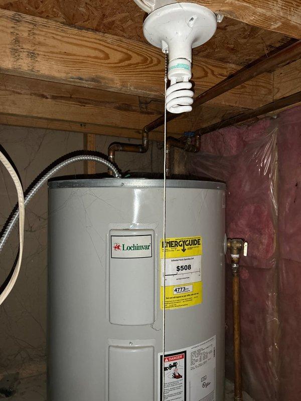 Provided comprehensive plumbing estimate for rental property conversion, evaluating and documenting shut-off valve replacement requirements throughout the home. Inspected and assessed washer/dryer hookup connections behind access panel, noting existing blue-handled valve and braided supply lines requiring replacement for improved reliability. Evaluated main water shut-off valve accessibility and condition near Lochinvar water heater in basement utility area. Photographed all plumbing components and connections to provide detailed documentation for repair scope and pricing approval.