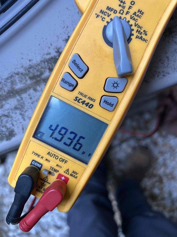 Completed preventive maintenance tune-up on dual HVAC system with gas furnace and air conditioning units located in basement and attic areas. Accessed equipment in confined spaces including tight closet installation, performed comprehensive inspection of both systems, verified gas furnace burner operation with all five burners igniting properly and producing proper blue flame, and conducted electrical diagnostics measuring system performance parameters. Both units serviced per manufacturer specifications with customer maintaining their own filter replacements between service visits.