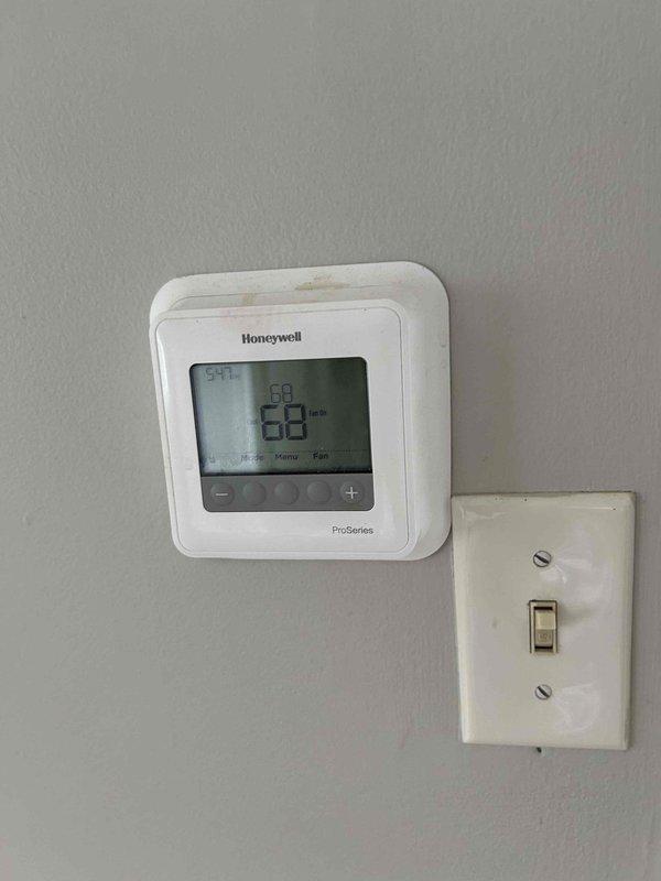 Completed residential installation of Friedrich mini-split heat pump system consisting of FAHFW12A3D indoor unit and FPHSR12A3DRun outdoor unit. Ran new 10-2 electrical wire from existing electrical panel to outdoor unit location with line hide conduit concealed along exterior brick wall, and installed 20-amp 2-pole breaker in panel. System commissioned and tested with indoor thermostat displaying proper operation at 68 degrees.
