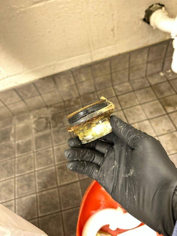 Responded to a commercial restroom facility to address a malfunctioning urinal flush meter and drainage system. Replaced heavily corroded internal components within the flush valve assembly, including the diaphragm, gaskets, and seals that had deteriorated due to extended water exposure and mineral buildup. Rebuilt the urinal drain assembly by removing the existing corroded tailpiece and installing new drain components with proper sealing to ensure leak-free operation. Tested the flush meter for proper activation and water flow, verified drain functionality, and confirmed no leaks at connection points upon completion.