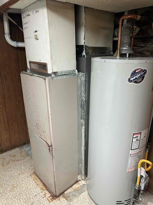 Completed full residential HVAC system replacement including installation of Lennox 70,000 BTU 93% AFUE gas furnace (ML193UH070XE36BK), Lennox 2.5 ton 14.3 SEER2 air conditioning unit (ML14KC1-030-230), and matching evaporator coil (CK40CT-30/36B-71) with digital thermostat. Removed and properly disposed of existing equipment, obtained necessary permits, and installed outdoor unit on new concrete pad with electrical disconnect box, whip kit, insulated refrigerant lines, and filter drier. Completed furnace installation with transitions to existing ductwork, standard air filter rack, flexible gas line connector with shut-off valve, electrical shut-off switch, flame rollout protection, and connection to flue piping. Installed evaporator coil with proper transitions to ductwork and SS2 coil drain safety water sensor. System tested and verified operational with all safety controls functioning correctly per manufacturer specifications and local code requirements.