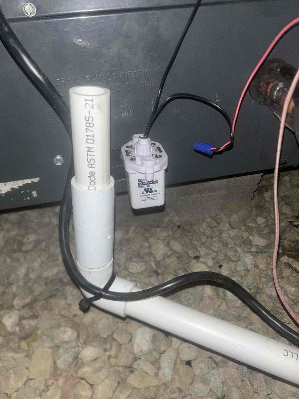Completed residential installation of Bryant 80% efficiency 70,000 BTU gas furnace (model 800SB36070M17) with removal and disposal of existing equipment. Installed condensate pump with drain line for AC unit, transition to evaporator coil, standard air filter rack, electrical and gas shut-off switches, flexible gas line connector, and flame roll-out protection. Configured flue piping per code requirements using single wall 4" adjustable elbow immediately outside furnace cabinet with double wall vent pipe for remaining run, integrated existing thermostat, obtained applicable permits, and verified all installations meet code compliance standards.