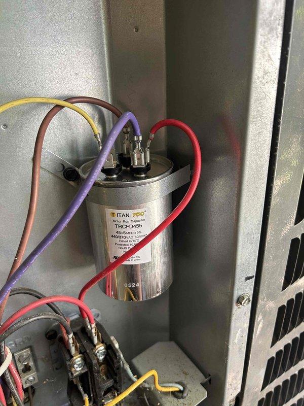 Completed Gold Level prepaid maintenance tune-up on air conditioning system with gas furnace located in crawlspace. Performed comprehensive inspection of electrical components including capacitor and contactor, verified proper connections and wire terminations. Tested capacitor using digital multimeter, recorded reading of 26.78 MFD to ensure component is functioning within specifications. Customer provided 20x25x1 air filter for installation during service visit.
