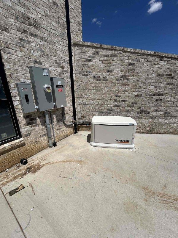 Successfully completed full electrical installation of a Generac backup generator system on rooftop concrete pad. Securely mounted generator unit to concrete surface and installed all required electrical infrastructure, including new conduit runs and generator cables from electrical panels to unit. Ran gas piping from existing shut-off valve to generator connection point. Installed battery, completed all electrical connections, and performed initial startup procedures to verify proper operation of the system.