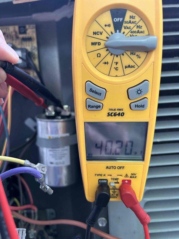 Completed comprehensive air conditioning maintenance and system diagnostics on basement-located gas furnace/AC combination unit as part of preventive care plan service. Performed thorough inspection of evaporator coil assembly, which showed acceptable cleanliness with minimal dust accumulation on fins and refrigerant lines. Utilized digital multimeter to verify electrical readings and system parameters, confirming proper voltage and operational specifications throughout the unit.