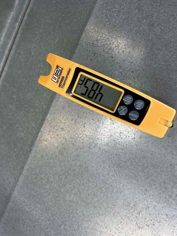 Responded to no cooling complaint on commercial Ruud RTU unit. Upon arrival, confirmed with site contact that incorrect unit was initially diagnosed on previous day's service call. Located and inspected correct rooftop unit experiencing cooling issues. Performed diagnostic testing and temperature measurements using pipe clamp meter, recording supply air temperature of 85°F. Identified unit requires 20x20x4 filter replacement and documented filter size on equipment for future maintenance reference. Unit operational status and specific repair recommendations provided to customer for approval.