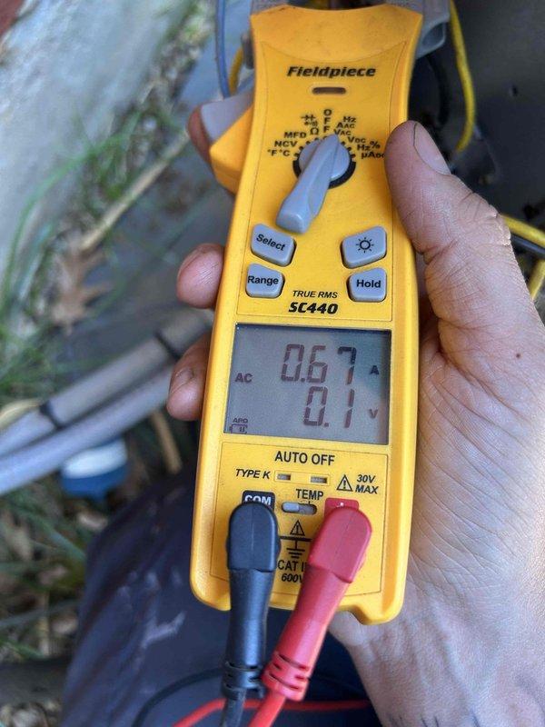 Completed scheduled Care Plan air conditioning tune-up and maintenance service. Performed comprehensive system diagnostics using clamp meter to verify electrical readings and amperage draw on outdoor unit components. Measured temperature differentials across the system using digital thermometer, recording 71°F reading. Customer provided replacement air filter, which was noted for their records. All system parameters checked and found operating within normal specifications.