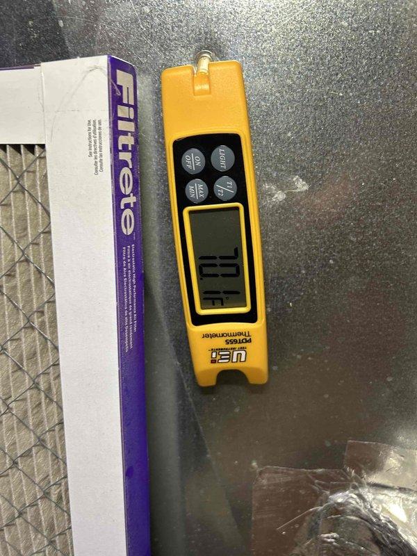 Completed scheduled Care Plan air conditioning tune-up and maintenance service. Performed comprehensive system diagnostics using clamp meter to verify electrical readings and amperage draw on outdoor unit components. Measured temperature differentials across the system using digital thermometer, recording 71°F reading. Customer provided replacement air filter, which was noted for their records. All system parameters checked and found operating within normal specifications.