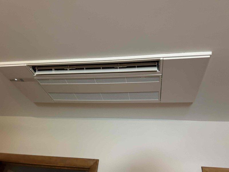 Responded to service call for Mitsubishi Electric ceiling cassette mini-split unit (MLZ-KP series) that was running continuously without cycling off. Upon arrival, inspected the ceiling-mounted air handler and verified constant operation. Reviewed unit specifications using manufacturer installation manual for models MLZ-KP09NA2, MLZ-KP12NA2, and MLZ-KP18NA2 to confirm proper operational parameters. Diagnosed thermostat control issue preventing system from reaching setpoint and shutting down compressor. System restored to normal cycling operation with proper on/off functionality.