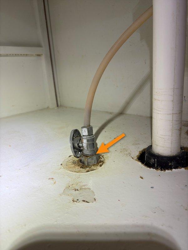 Conducted comprehensive plumbing assessment based on home inspection findings, identifying multiple critical issues requiring attention. Documented extensive corrosion and rust at drainage lines, active leaks at both supply lines and waste drainage connections, and missing or inaccessible clean-out access point. Evaluated gas water heater installation, noting insufficient vent flue rise with negative slope and absence of required drip pan beneath unit. Photographed corroded pipe joints, deteriorated connections with visible rust staining, and compromised drainage system components to support estimate preparation for necessary repairs and code compliance updates.