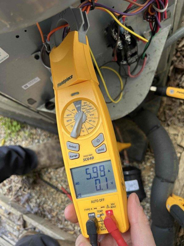 Completed annual care plan maintenance tune-up on HVAC system as part of complimentary first-year service included with equipment installation. Performed comprehensive system inspection including examination of control board components, verified all wire connections at terminal blocks, and tested electrical parameters using clamp meter which confirmed proper amperage draw of 5.98A. All electronic components, resistors, capacitors, and low-voltage thermostat wiring connections found to be in good working condition with no issues identified.
