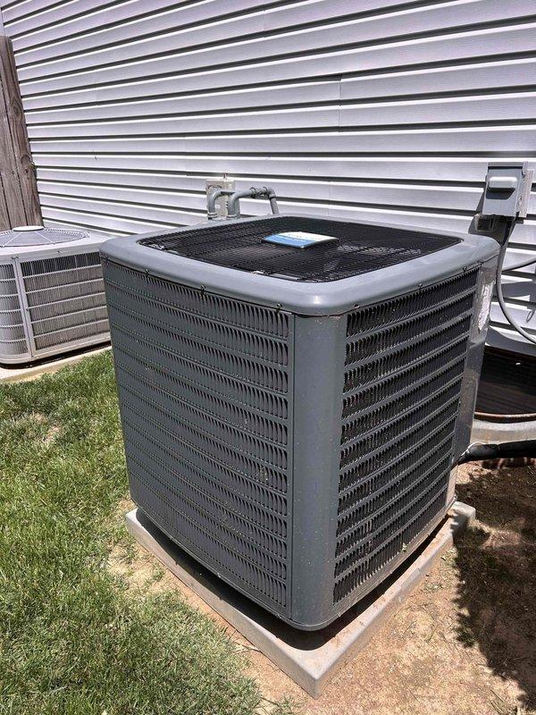 Responded to service call for HVAC system producing unusual noise and insufficient cooling with thermostat set to 70°F. Performed diagnostic inspection of outdoor condenser unit and indoor control board. Examined compressor operation, refrigerant line connections, and electrical components including PCB with integrated circuits and terminal connections. Identified operational issues affecting system performance and cooling capacity. Documented equipment condition with photographs of outdoor unit installation and control board wiring configuration for service records.