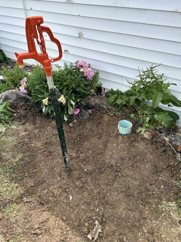 Excavated and replaced leaking farm hydrant at base due to water seepage from compromised underground connection. Installed new water main shut-off valve adjacent to hydrant location. Backfilled excavation area and restored surrounding landscape after verifying proper operation and seal integrity of both the replacement hydrant and shut-off valve assembly.