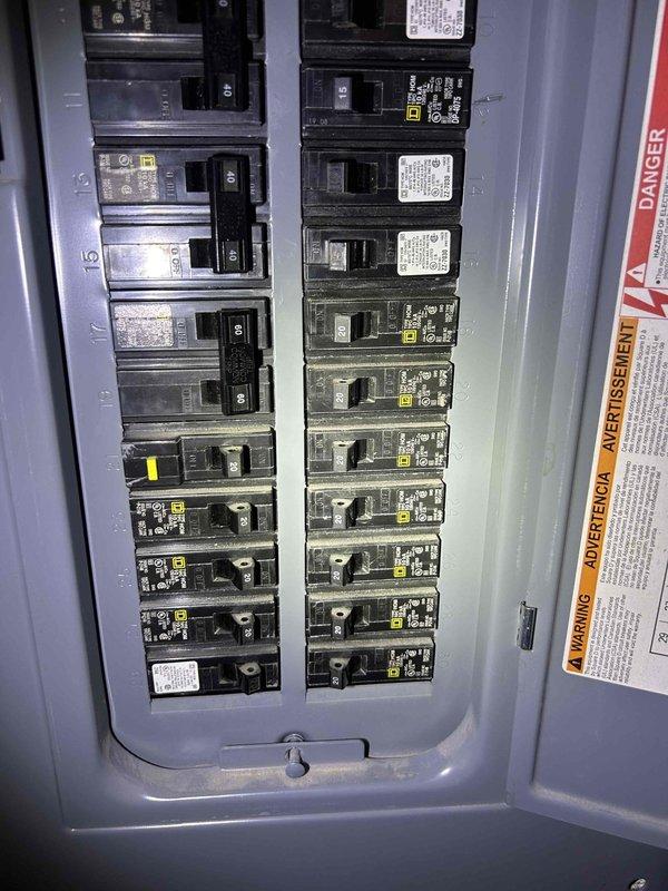Responded to water leak complaint occurring around furnace and water heater area in basement only when air conditioning system is operating. Performed diagnostic inspection of HVAC system and identified condensate drainage issue from indoor evaporator coil. Inspected condensate drain line, verified proper airflow across coil, and monitored temperature differential to confirm system operation. Documented electrical panel configuration and ductwork insulation condition with temperature readings to ensure proper system performance and rule out secondary moisture sources.