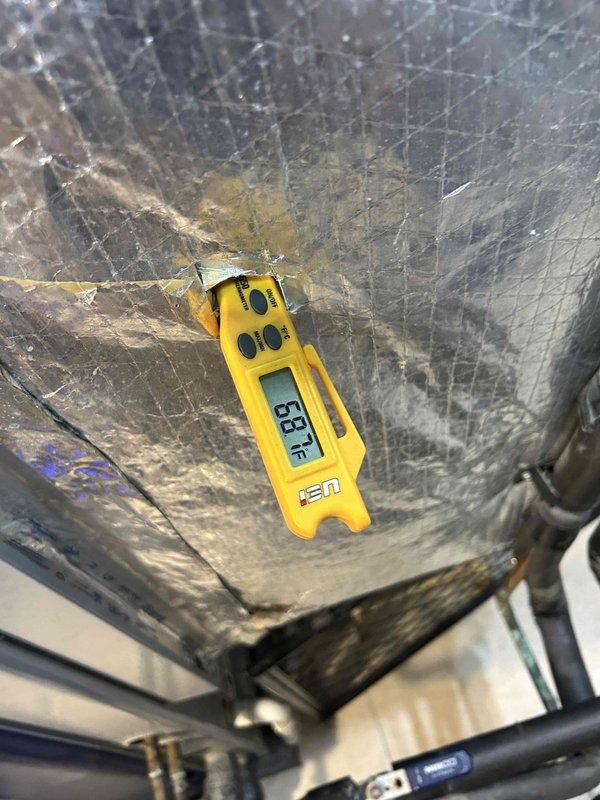 Completed comprehensive Care Plan tune-up on basement HVAC unit with washable filter. Performed system diagnostics including pressure testing and temperature verification, recording 33°F at evaporator coil which indicates proper cooling operation. Inspected air handler components, ductwork insulation, and verified all mechanical connections for optimal system performance.