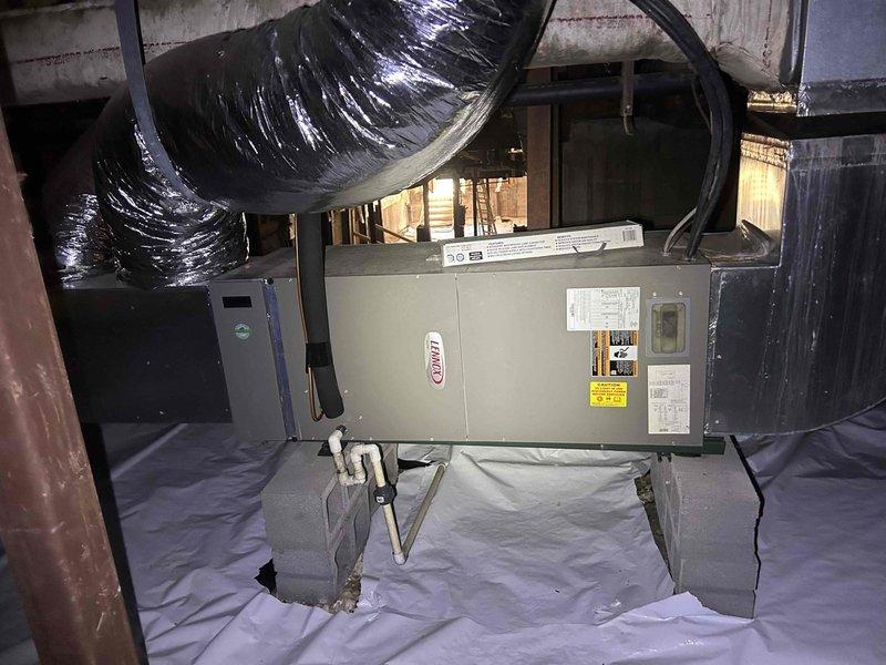 Responded to no cooling call for residential Lennox HVAC system with dual outdoor condensing units. Upon arrival, accessed crawl space installation and inspected furnace/air handler unit and associated ductwork. Performed diagnostic evaluation of both exterior condensing units and verified system operation, restoring cooling functionality to the home.