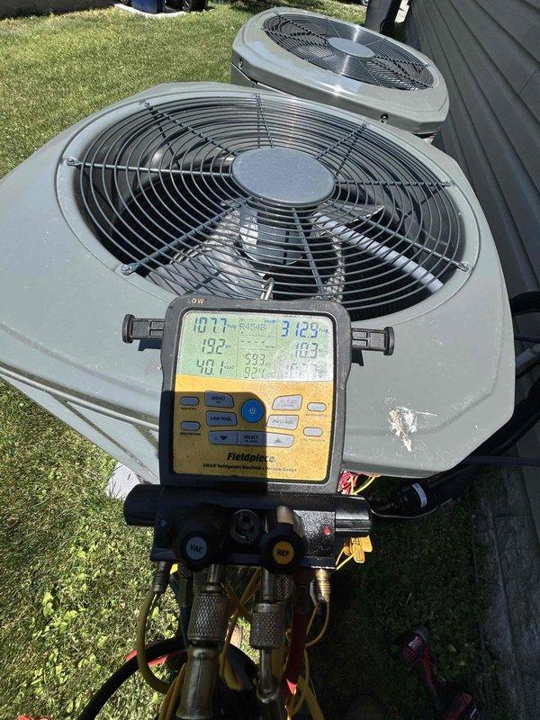 Performed comprehensive Care Plan tune-up on two newly installed heat pump systems with air handlers located in basement and attic. Completed full system diagnostics on both outdoor units using digital manifold gauges, recording refrigerant pressures, temperatures, superheat, and subcool readings to verify proper system operation and charge levels. All measurements confirmed systems operating within manufacturer specifications with appropriate refrigerant charge and airflow.