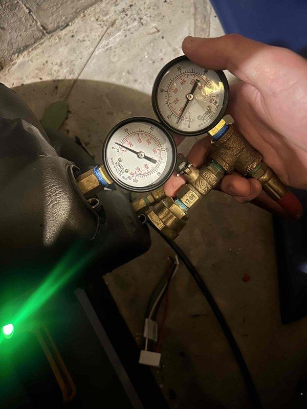 Responded to no cooling complaint on return visit. Coordinated with technical support and used Aurora AID diagnostic tool to troubleshoot system performance issues. Performed pressure testing with manifold gauges to verify refrigerant charge and system operation, identifying root cause of cooling failure following previous service visit.