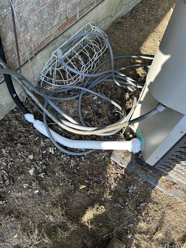 Responded to no cooling complaint on gas furnace system over 10 years old at rental property. Arrived on site before noon as requested and contacted tenant for access to hallway closet indoor unit location. Performed diagnostic evaluation of complete HVAC system including indoor air handler and outdoor condensing unit. Inspected refrigerant lines, electrical connections, and condenser unit exterior installation. Evaluated air handler cabinet, associated ductwork, and electrical panel connections in mechanical closet. Documented system conditions with photographs showing outdoor unit installation area and indoor equipment configuration. Communicated findings and recommended repairs to property owner prior to proceeding with any corrective work per rental property protocol.