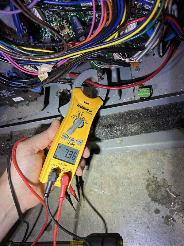 Completed scheduled preventive maintenance tune-up on basement geothermal HVAC system with Ultra Zone control module. Performed comprehensive system diagnostics including electrical testing of control board circuits, verified proper voltage readings at 7.38V on zone control components, and inspected all wiring connections and refrigerant lines for proper operation. All zone damper controls, electrical connections, and system components found operating within normal parameters; system ready for continued service under care plan coverage.