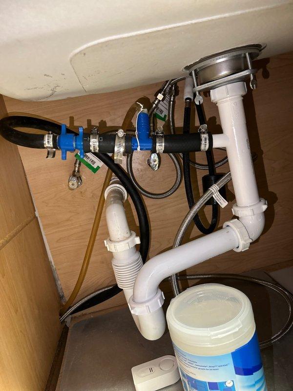 Completed comprehensive 60-point whole home plumbing inspection and performed tankless water heater flush service. Inspection included thorough evaluation of all accessible plumbing fixtures, supply lines, drain assemblies, and shut-off valves throughout the property. Flushed tankless water heater system to remove mineral buildup and sediment accumulation, ensuring optimal unit performance and efficiency. Documented under-sink plumbing conditions including PVC drain assemblies, P-traps, supply line connections, and shut-off valve operation. All systems found to be functioning properly with no immediate repairs required.