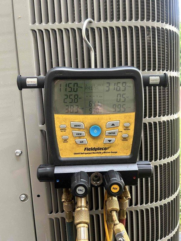 Responded to callback for ongoing water leak issue. Performed comprehensive system diagnostics using refrigerant manifold and micron gauge to check pressures and temperatures across all zones. Connected service hoses to condensing unit valve ports to verify refrigerant charge levels and rule out evaporator coil freeze-up as potential leak source. Measured refrigerant weight at 2.3 lbs using wireless scale on tank to confirm proper charge. Inspected all visible refrigerant lines, condensate drain system, and connections at outdoor unit. Unable to locate source of water leak during this visit. Recommend continued monitoring and possible camera inspection of drain lines or further investigation of indoor air handler components on next service call.