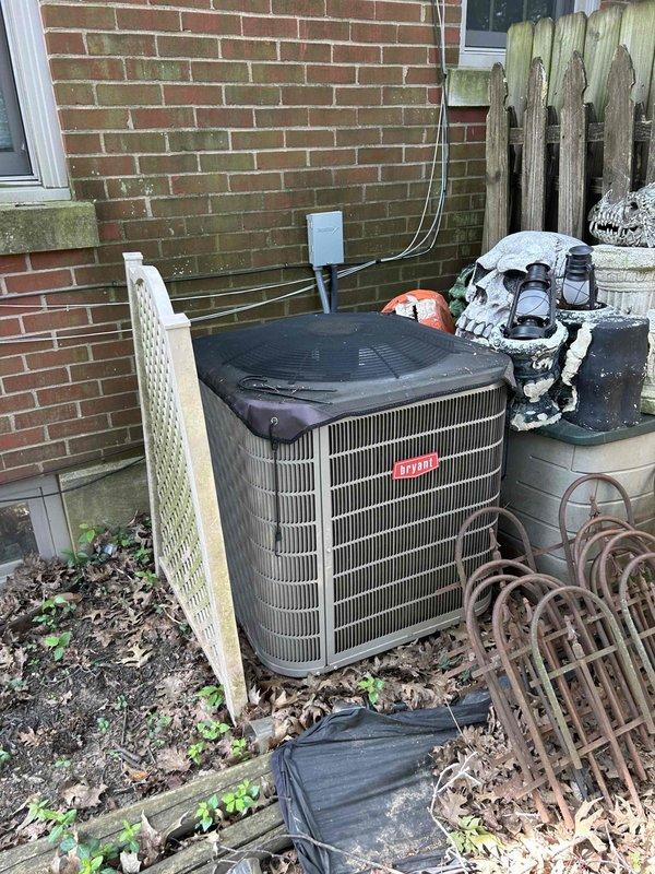 Responded to no cooling complaint on 4-year-old Bryant AC system blowing warm air with indoor temperature reading 75°F against 69°F setpoint. Performed diagnostic evaluation of outdoor condensing unit and indoor air handler located in basement. Measured supply air temperatures at ductwork using digital thermometer to verify cooling performance. Inspected refrigerant lines, electrical connections, and overall system operation to identify cause of warm air discharge that began previous evening.