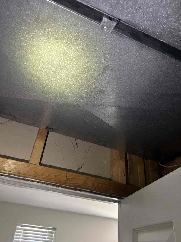 Returned to property to assess water line repair needs and provide estimate for new gas line installation. Accessed utility space and mechanical areas to evaluate existing piping infrastructure and determine optimal routing for proposed gas line. Documented conditions of confined work area including HVAC ductwork, structural framing, and available pathways for new pipe installation. Completed visual inspection of ceiling space and mechanical chase to identify connection points and clearance requirements for gas line run.