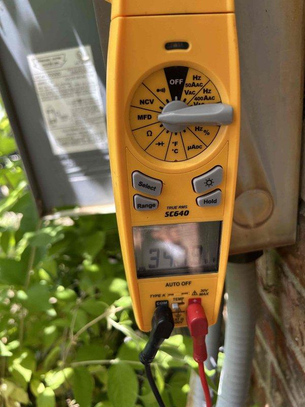 Completed annual care plan maintenance tune-up on gas furnace and air conditioning system located in closet installation. Performed comprehensive system inspection including electrical testing with multimeter, which confirmed capacitor reading of 35.8 MFD within acceptable operating range for outdoor condensing unit. Verified proper airflow through existing Z-Line series filter provided by customer in 16x20x1 size. All components tested and operating within manufacturer specifications at time of service.