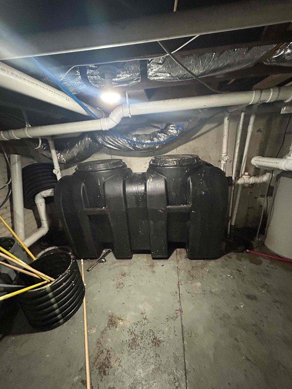 Completed commercial grease trap repair by installing a new 4" tee with vent and drainage pipe extending into the trap on both sides immediately downstream of the grease trap location. Work was coordinated to begin after the grease trap pumping was completed. Secured the baffle assembly to prevent future operational issues and ensure proper grease trap function.