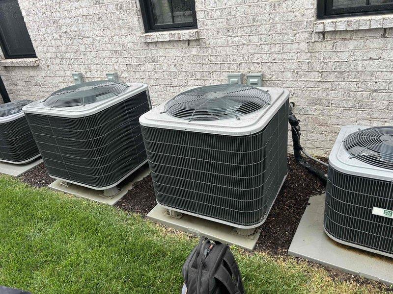 Responded to no cooling complaint on 5-year-old electric air conditioning system. Upon arrival, thermostat displayed 83°F actual temperature while set to 72°F in cooling mode with fan circulating. Performed diagnostic evaluation of indoor air handler and outdoor condensing unit located in multi-unit installation. Identified system malfunction, completed necessary repairs to restore proper cooling operation, and verified system functionality before departure.