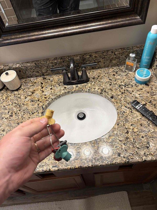 Completed routine plumbing inspection of bathroom fixtures as part of preventative service agreement. Performed operational testing of faucet, verified proper water flow and drainage at vanity sink, and inspected shut-off valves beneath the fixture to ensure proper function and absence of leaks.