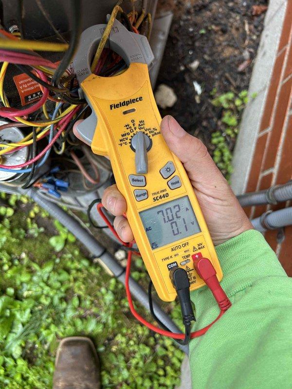 Performed Care Plan tune-up on heat pump air handler system and mini-split unit located in crawlspace and second floor. Conducted electrical diagnostics and measurements using clamp meter, verified voltage readings at 450V and amperage at 702mA on system components, and completed preventive maintenance inspection per club membership agreement.