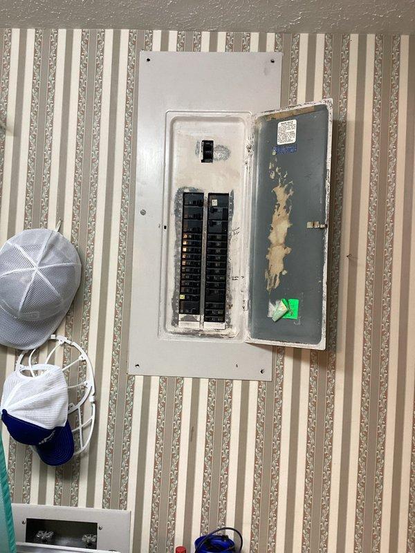 Conducted comprehensive electrical assessment for generator installation at residential property. Evaluated existing electrical panel condition, noting deteriorated interior door panel requiring attention prior to generator integration. Documented current circuit breaker configuration and available capacity in main service panel to determine proper sizing and connection requirements for standby generator system. Assessed utility room electrical infrastructure and load requirements to ensure adequate power distribution for proposed automatic transfer switch installation.