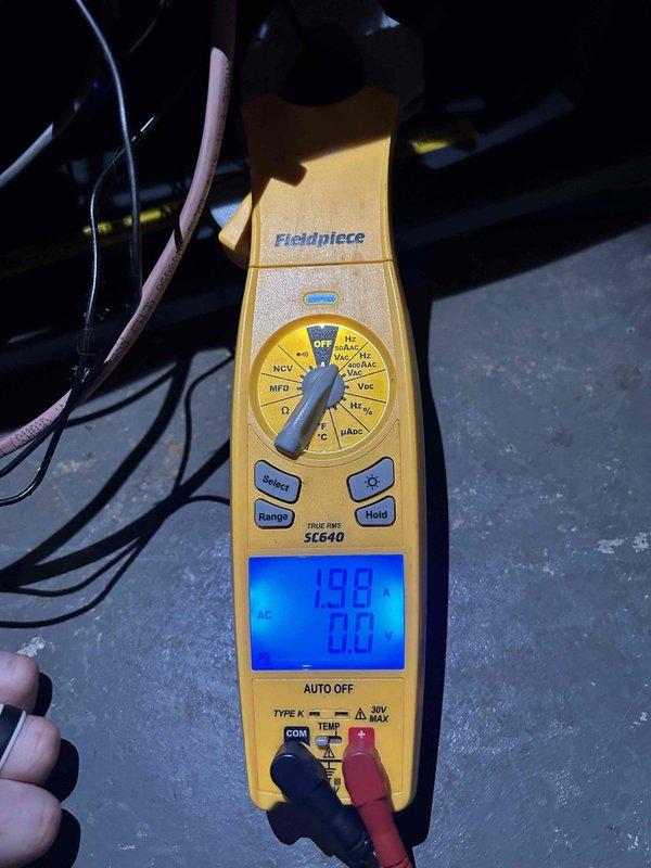 Completed routine AC tune-up on a 9-year-old air conditioning system located in the basement. Performed comprehensive maintenance including electrical testing with multimeter, inspected condensate pump assembly, and verified all system components were operating within normal parameters. System checked and confirmed to be functioning properly.