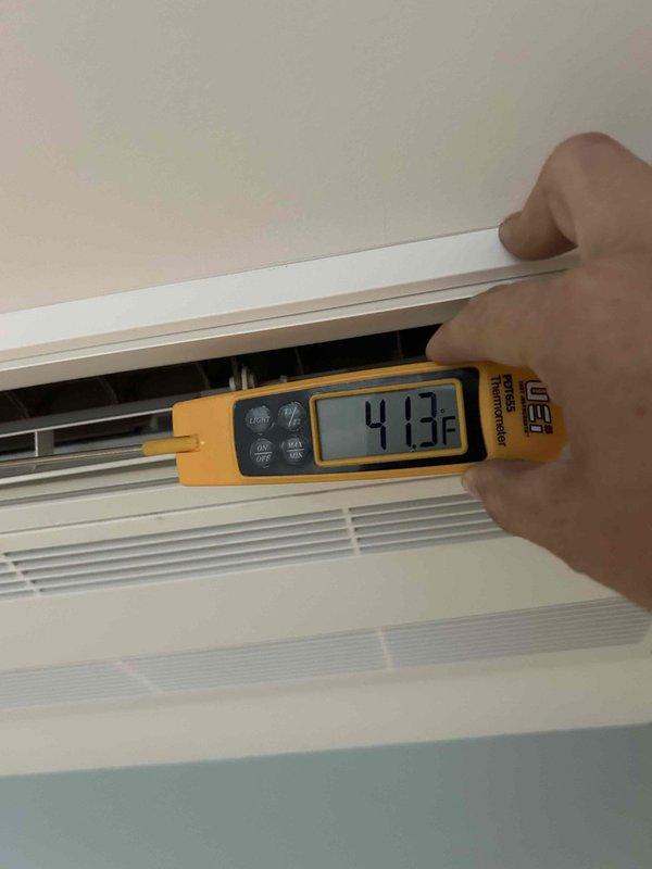 Completed Gold Level prepaid maintenance on 3-year-old mini split system located in attic with access through bathroom. Performed comprehensive inspection and testing of unit, including temperature readings at supply vent which measured 41.3°F, confirming proper cooling operation. System operating within normal parameters with all components functioning as designed.