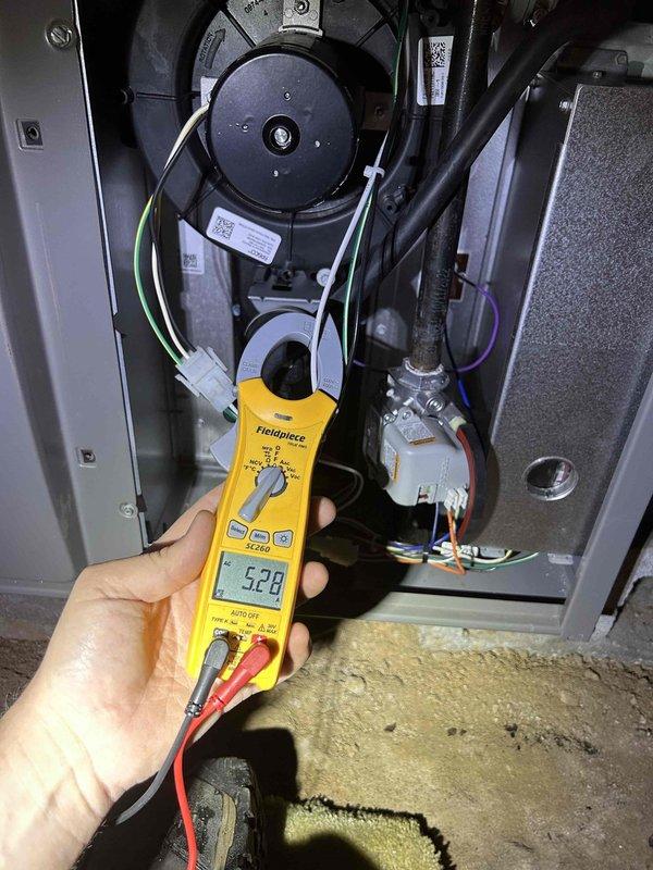 Completed Care Plan tune-up on air conditioning system with gas furnace located in crawlspace. Performed comprehensive maintenance inspection of indoor air handler, measuring electrical parameters with multimeter to verify proper system operation and component functionality. Inspected outdoor Lennox condenser unit, confirmed proper installation on concrete pad, and verified refrigerant line connections and insulation integrity. System operating within normal parameters upon completion of preventive maintenance service.