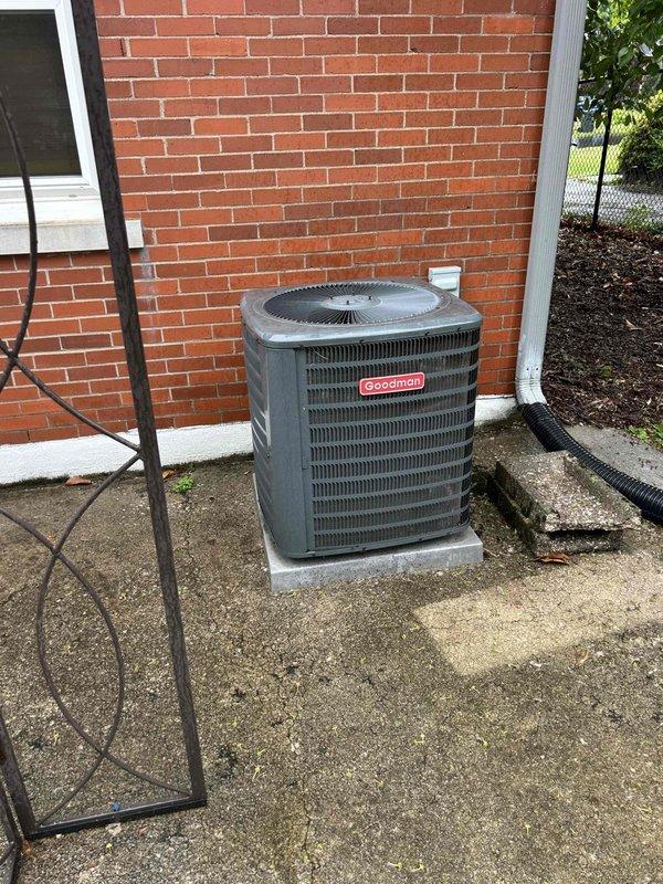 Completed Care Plan tune-up service on Goodman air conditioning system. Accessed equipment through crawl space where customer-provided 16x20x4 Filterbuy filter was inspected and noted in place. Performed standard maintenance procedures on outdoor condensing unit located on concrete pad against exterior brick wall, verifying proper operation of all components. System operating within normal parameters upon completion of preventative maintenance visit.