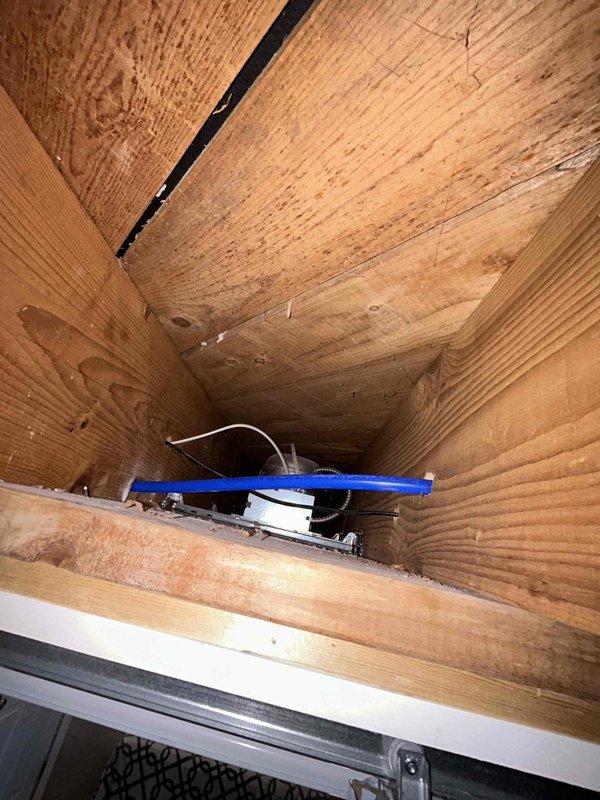 Accessed ceiling cavity to remove and replace deteriorated galvanized water supply line. Cut opening in drywall ceiling to expose existing pipe run and structural framing. Removed old galvanized piping and installed new PEX water line through ceiling space, securing properly to structural members. Installed new hose bibb at designated location and pressure tested system to verify proper operation and confirm no leaks. All connections made to code specifications with appropriate fittings and support.