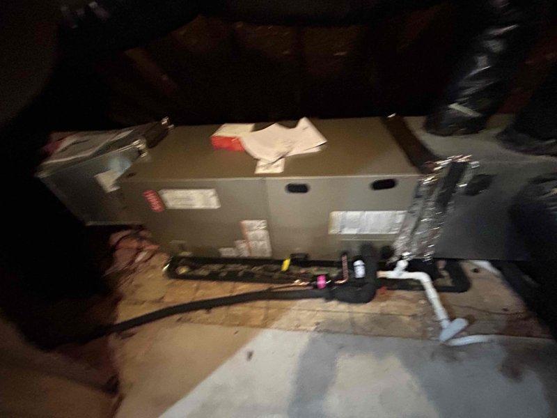 Completed full heat pump and air handler replacement at residential property. Removed existing equipment and installed Bryant 3.5 ton 14.3 SEER2 single stage heat pump system with matching air handler in walk-in attic, 15KW auxiliary heat kit, and Honeywell programmable digital thermostat. Installation included outdoor unit pad with snow legs, electrical disconnect box, electrical whip kit, insulated refrigerant lines with filter, trap, SS2 coil drain safety sensor, ceiling saver overflow drain pan with water sensor, transition to existing ductwork, and standard air filter rack. All permits obtained, electrical connections completed per code, system tested and operational, existing equipment removed and disposed of properly.