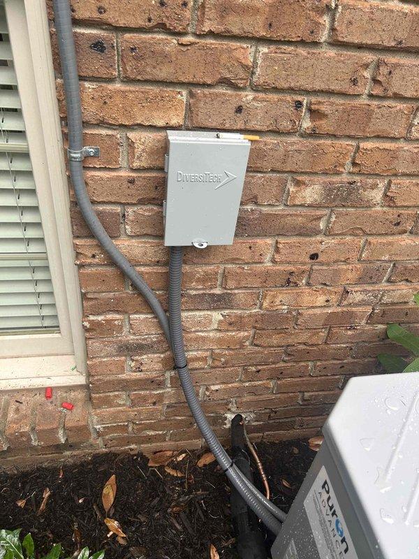 Completed full heat pump and air handler replacement at residential property. Removed existing equipment and installed Bryant 3.5 ton 14.3 SEER2 single stage heat pump system with matching air handler in walk-in attic, 15KW auxiliary heat kit, and Honeywell programmable digital thermostat. Installation included outdoor unit pad with snow legs, electrical disconnect box, electrical whip kit, insulated refrigerant lines with filter, trap, SS2 coil drain safety sensor, ceiling saver overflow drain pan with water sensor, transition to existing ductwork, and standard air filter rack. All permits obtained, electrical connections completed per code, system tested and operational, existing equipment removed and disposed of properly.