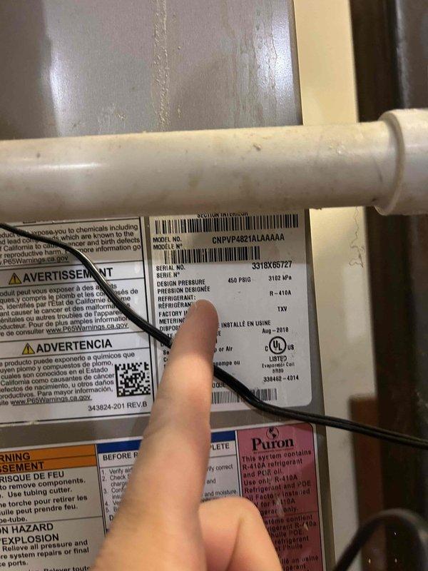 Completed comprehensive Care Plan tune-up on dual-zone HVAC system with equipment located in attic and basement. Performed preventive maintenance on Carrier CNPVP4821ALAMAA unit (2010 installation) utilizing R-410A Puron refrigerant, verified system pressures at 450 PSIG design specification, and inspected all components for proper operation. Customer supplied humidifier pad for replacement during service visit. Verified thermostat programming and operation on Carrier digital touchscreen unit, confirming auto mode functionality with heat set to 68°F and cool set to 80°F, with room temperature reading 68°F at time of service. Both attic and basement systems inspected, serviced, and confirmed operational per manufacturer specifications.