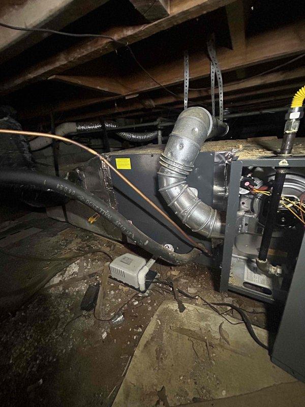 Completed comprehensive cooling maintenance and tune-up on a 9-year-old residential air conditioning system located in crawl space. System was found operating properly upon arrival. Performed standard preventive maintenance procedures including inspection of all electrical connections, refrigerant levels, and ductwork integrity. Verified proper operation of all components, checked flexible duct connections and mounting hardware for security, and confirmed system functionality. Unit left in good working condition with no issues identified.