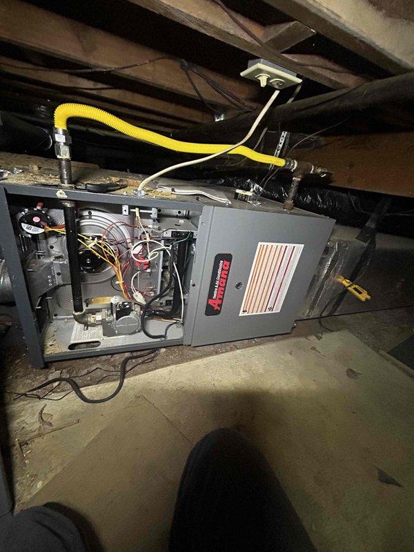 Completed comprehensive cooling maintenance and tune-up on a 9-year-old residential air conditioning system located in crawl space. System was found operating properly upon arrival. Performed standard preventive maintenance procedures including inspection of all electrical connections, refrigerant levels, and ductwork integrity. Verified proper operation of all components, checked flexible duct connections and mounting hardware for security, and confirmed system functionality. Unit left in good working condition with no issues identified.